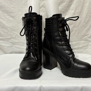 Heeled lug sole hiker booties. Size 9